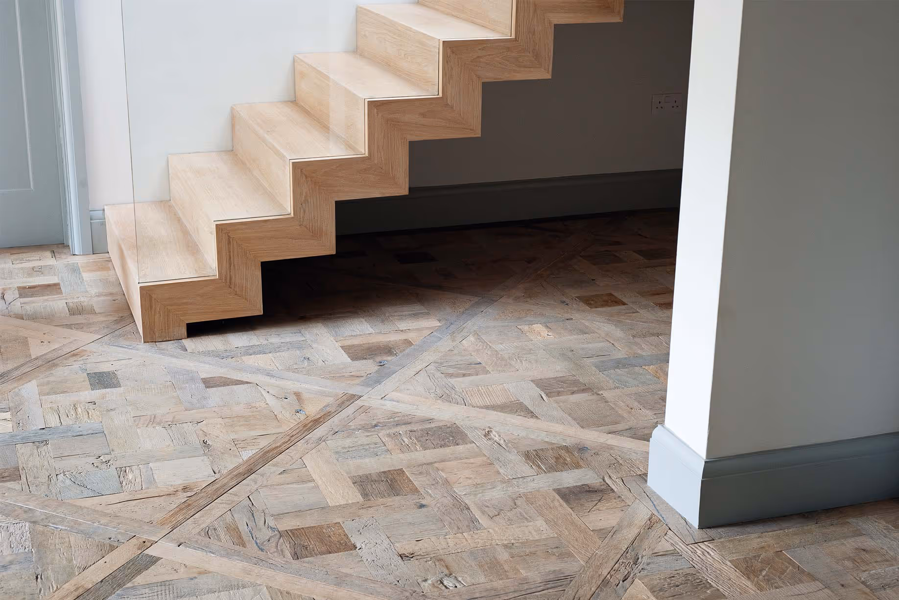 A reclaimed antique parquet floor.