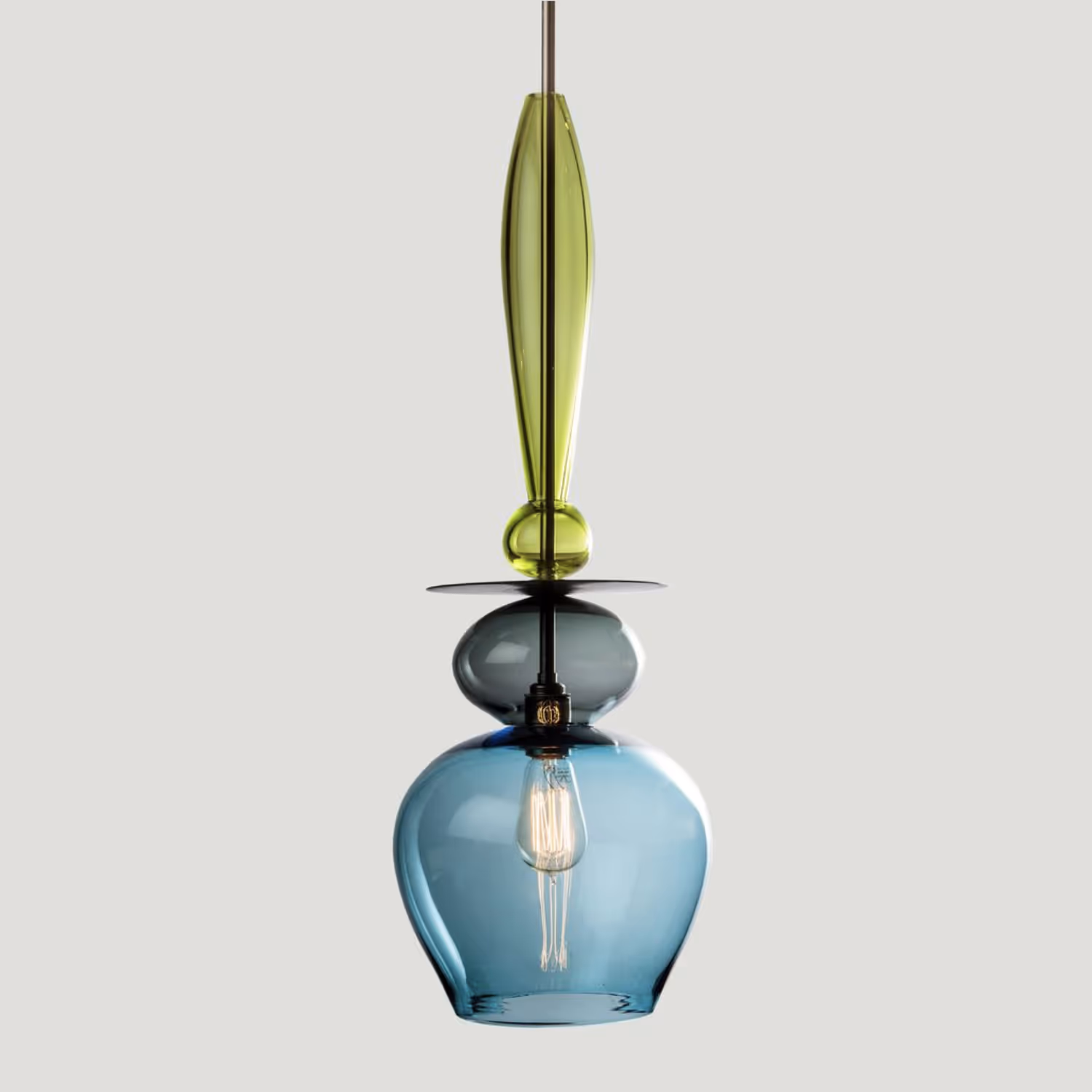 A modern pendant light made from handblown green, grey and ocean blue glass.