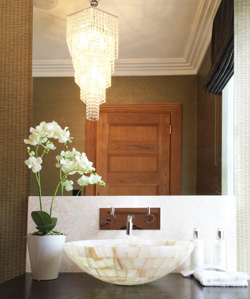 Onyx handbasin in an elegant bathroom