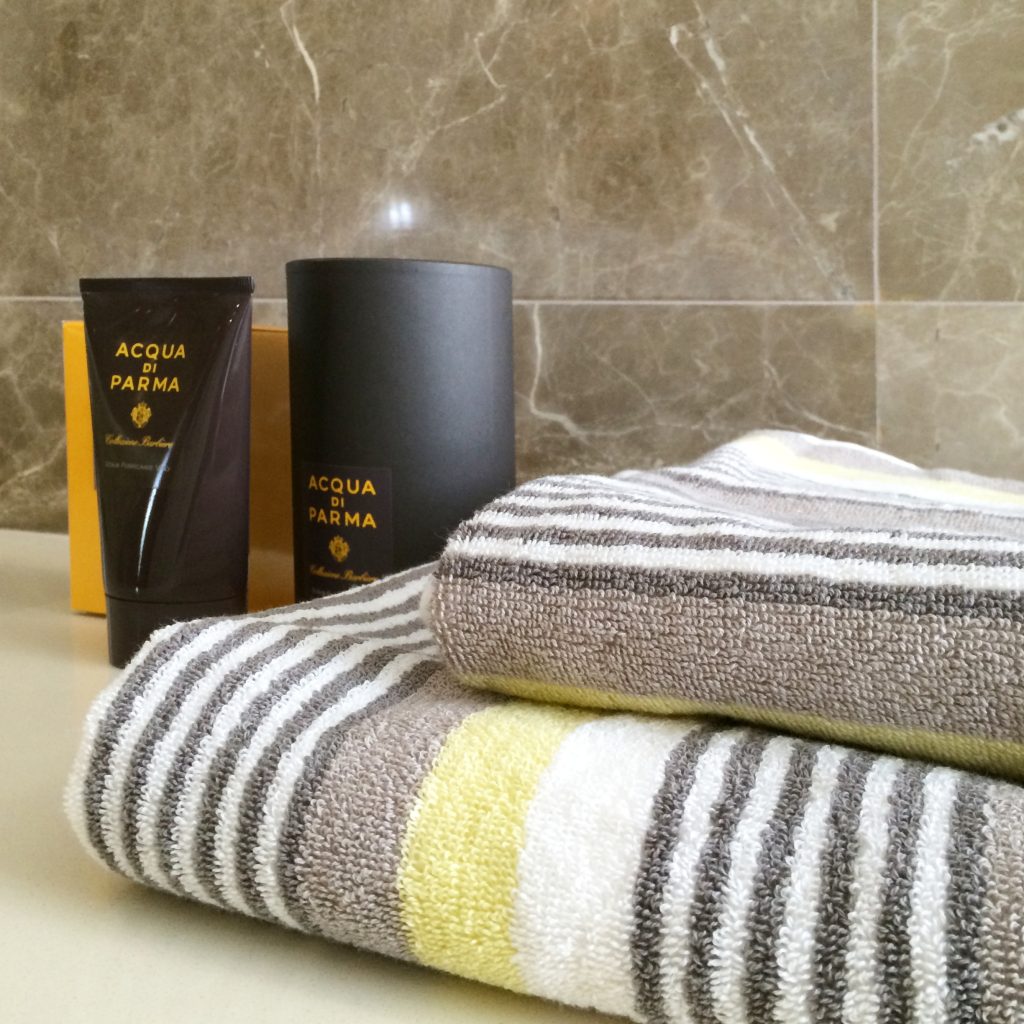 Stack of grey and yellow towels
