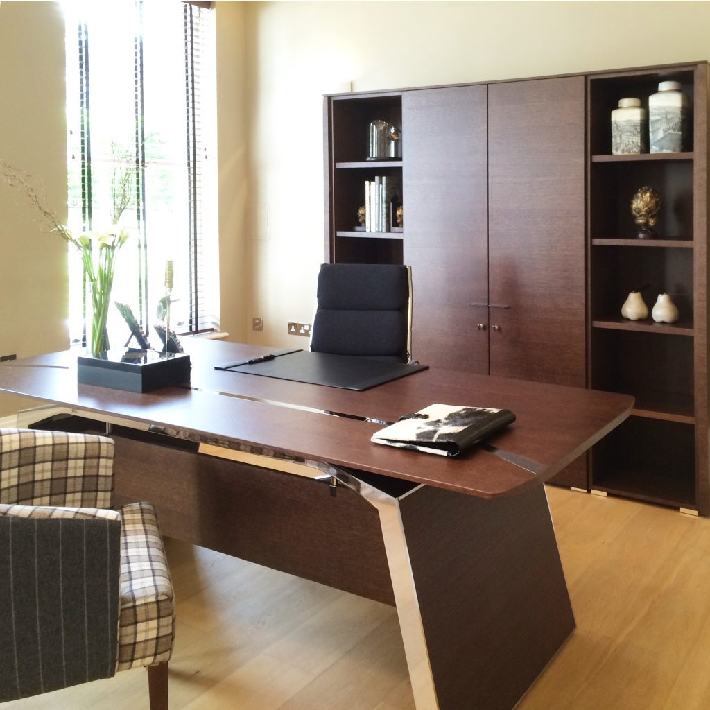 Gentleman's home office with walnut bookcases and large partners desk