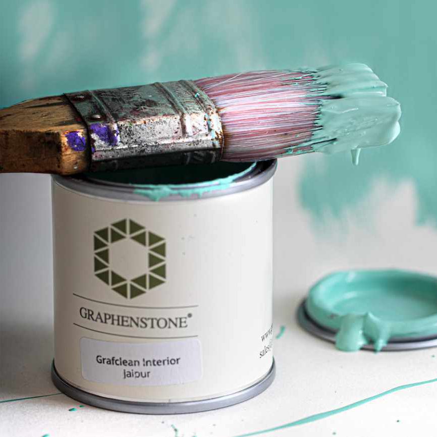 Tin of eco friendly paint in turquoise colour