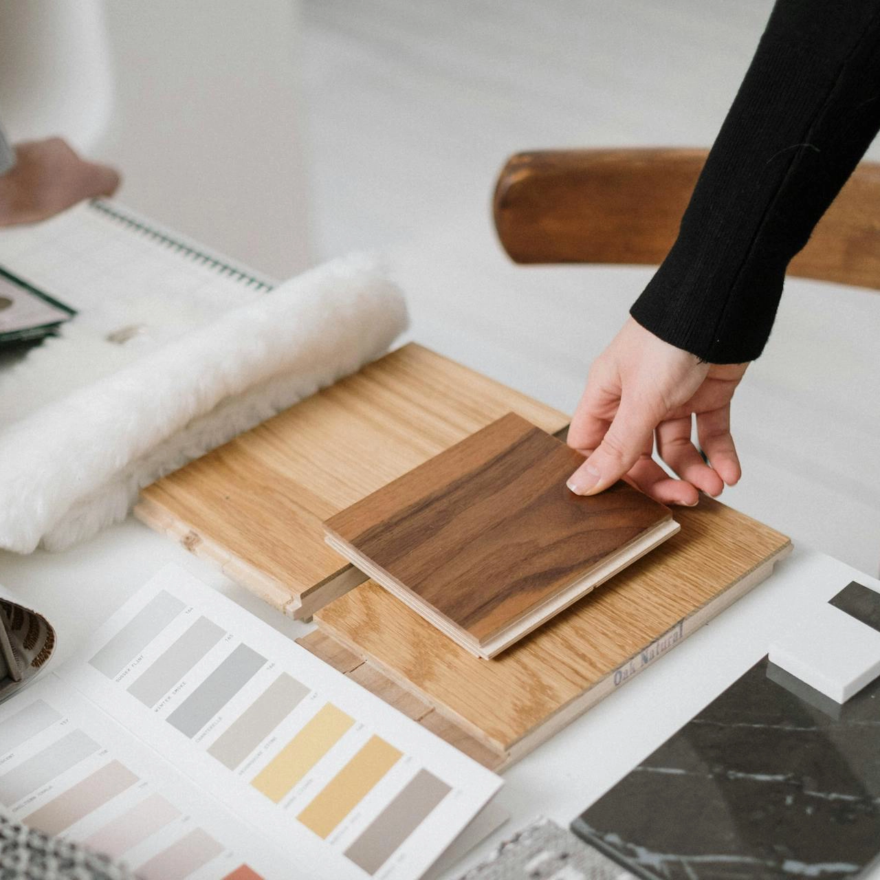 Wooden flooring samples and a paint chart