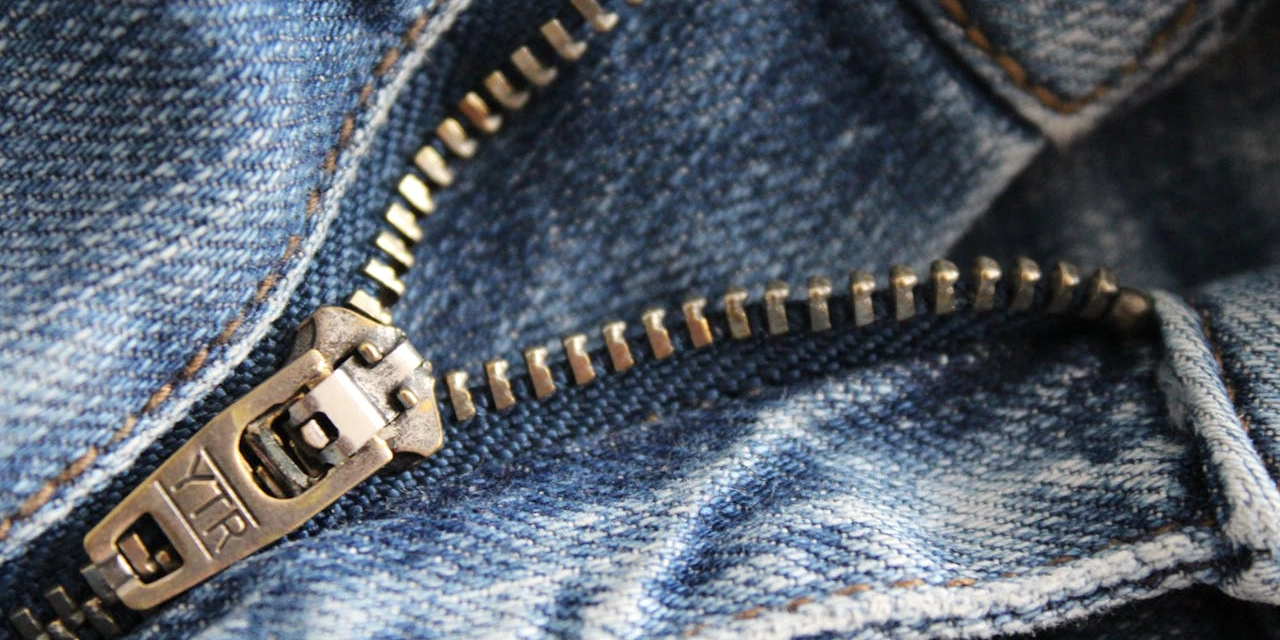 Close up of a zip in a pair of jeans