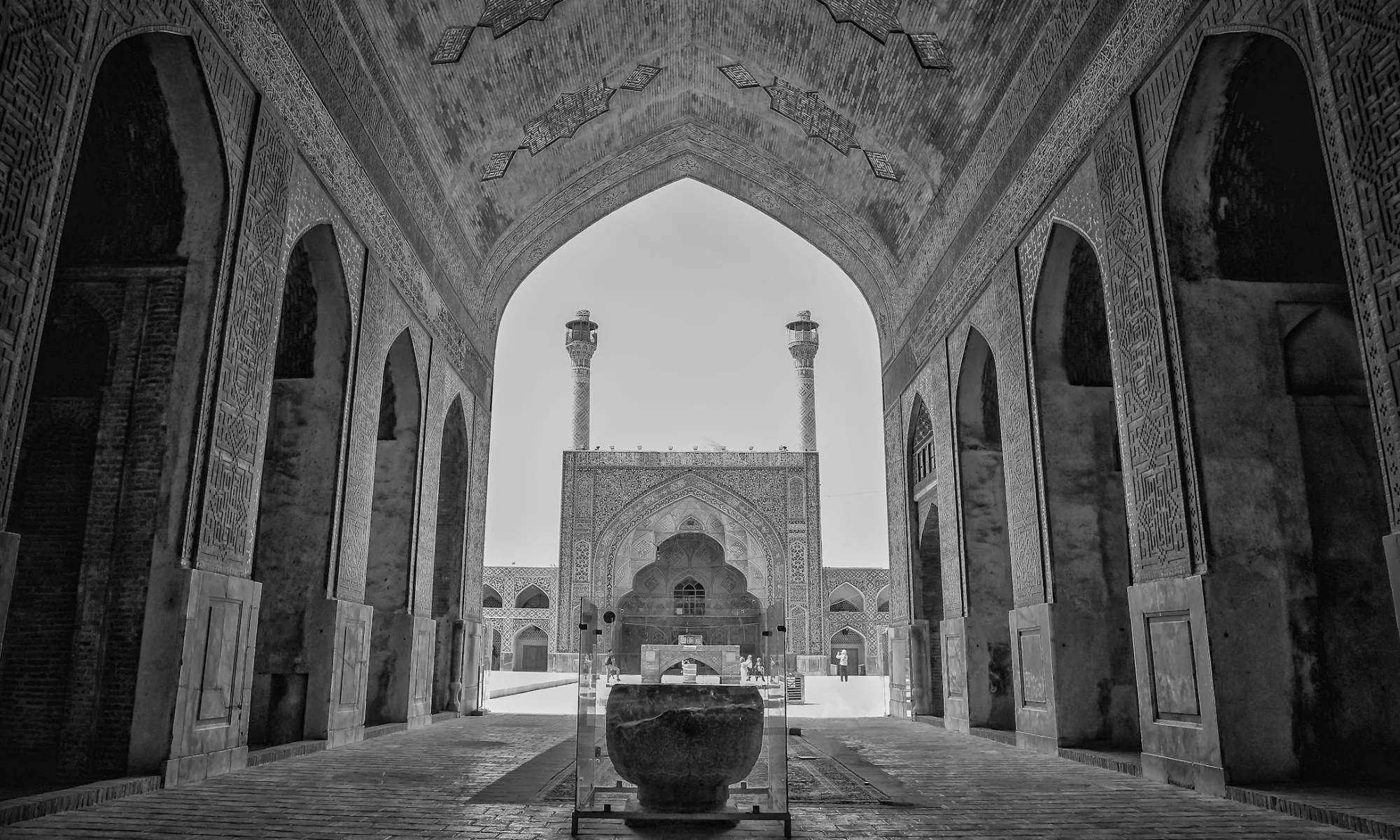 A black and white image of an Islamic mosque